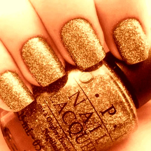OPI gold-glitter lacquer, one of the premium products used at Atelier Rose Nails