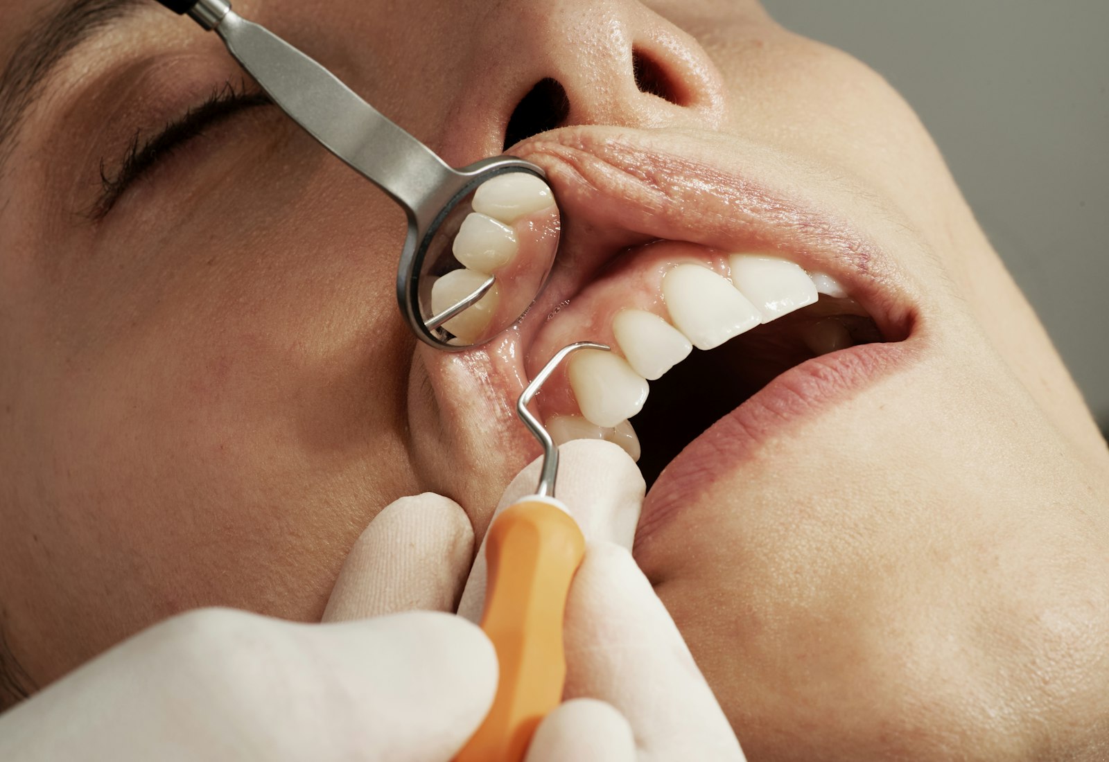 A Golflands clinician reviewing a patient's dental x-rays
