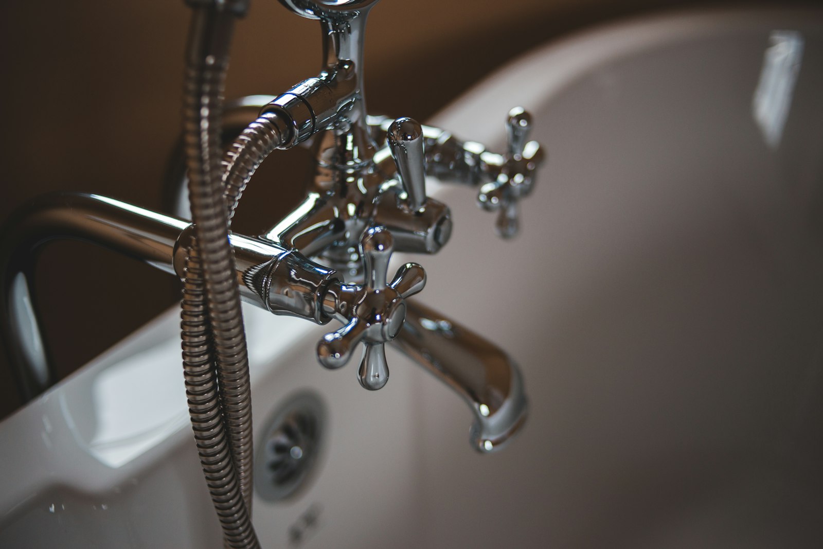 Chrome mixer tap fitted to a bath by Macks Plumbers